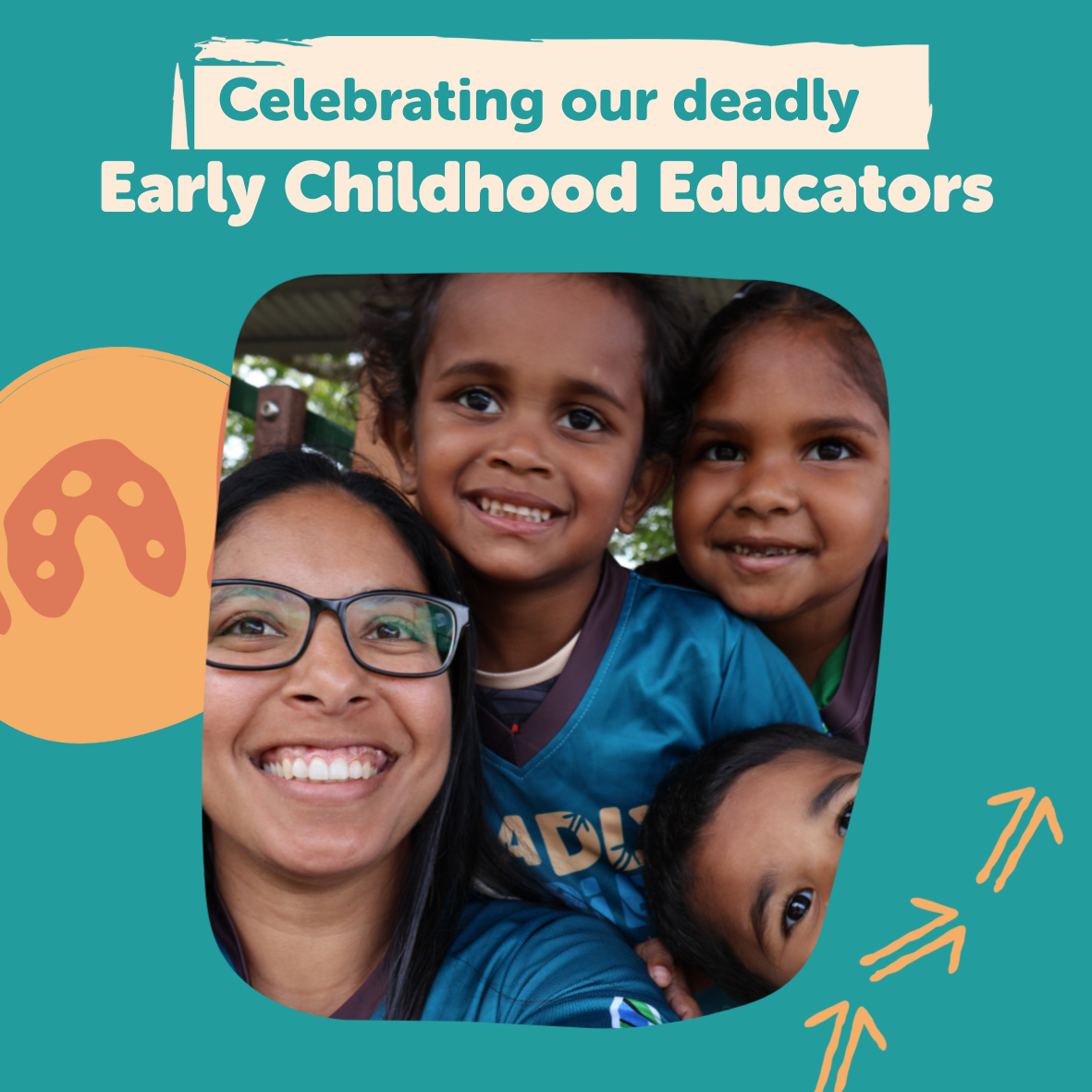 Kim Appo and three children wearing Deadly Kindies blue shirts smile at the camera in front of a teal background. The image includes the text 'Celebrating our deadly Early Childhood Educators' along with an orange paint palette icon and three orange arrows.